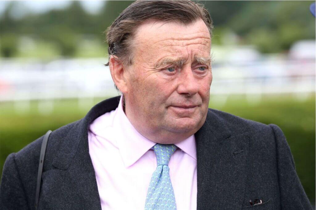 Top National Hunt Racehorse Trainer Nicky Henderson at Market Rasen Races thinking of Cheltenham gold cup