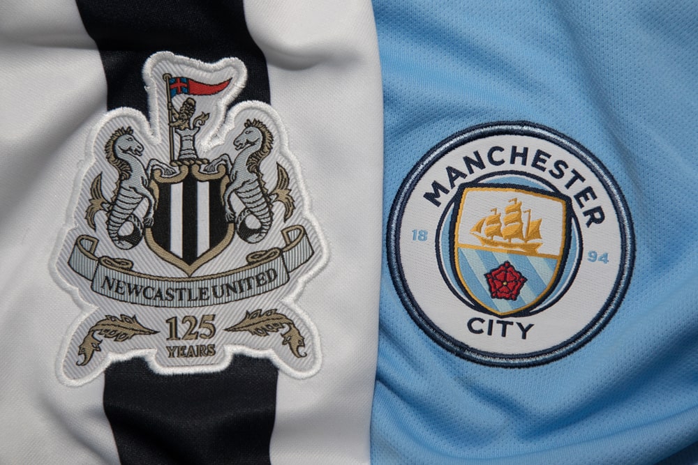 NewCastle United or Manchester City logos on jerseys